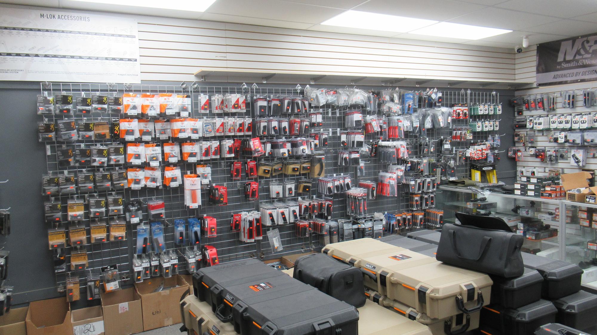 Firearm accessories wall and hard cases