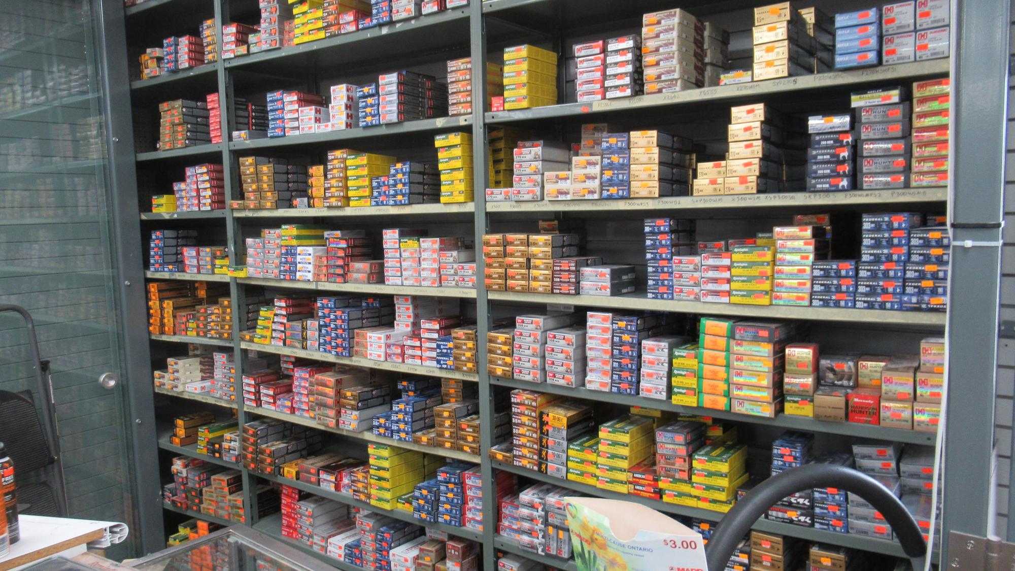 Shelving stocked with rifle, shotgun and handgun ammunition